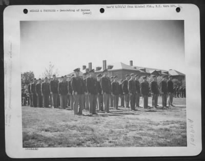 Groups > Reviewing Troops On Parade In Their Honor At Mitchel Field, New York, 51 Officers And Men Of The Anti-Submarine Command Take Their Places Alongside Brigadier General Westside T. Larson, Who Presented Them With The Air Medal For 200 Hours Of Atlantic Patro
