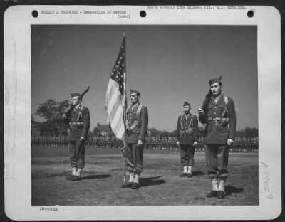 Groups > Color Guard And Air Base Squadron Stand At Attention During Mitchel Field, New York, Ceremonies, Honoring 51 Officers And Men Of The Anti-Submarine Command For Atlantic Patrol. Technical Sergeant William Cappilino Is Color-Bearer, Flanked By Staff Sergean