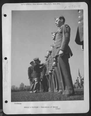 Groups > Combat Crew Member, Sergeant Welton K. Fulton Flew In Service Overseas, Wears Ribbon For European Theater Operations. Now He Wins The Air Medal, Pinned On Here By Brigadier General Westside T. Larson At Mitchel Field, New York, Ceremonies. The Blue-And-Go