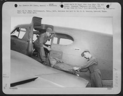 Groups > Capt. W. H. Hays, Williamsport, Penn., Left, Delivers The Mail To Lt. H. H. Brannon, Lubbock, Texas. Capt. Hays Flies Mail. [Oahu, Hawaii - With Cessna Uc-78]