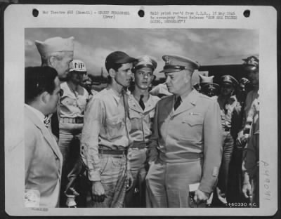 Groups > 'How Are Things Going, Sergeant'? The Answer Might Be 'Not So Good', Judging From The Expression On Sgt. Julian Ridgeway'S Face, During A Conversation He Had With General Eisenhower During The Latter'S Recent Visit To Hickam Field, Hawaii. Ridgeway Is Cre