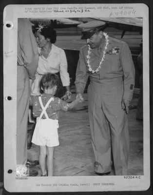 Groups > Lt. General Ira C. Eaker, Right, Deputy Commander Of The Army Air Forces, Received A Typical Hawaiian Welcome On His Arrival At Hickam Field, 24 April 1946 On The First Leg Of An Extensive Inspection Tour Of Pacific Air Bases. He Is Shown Wearing The Trad