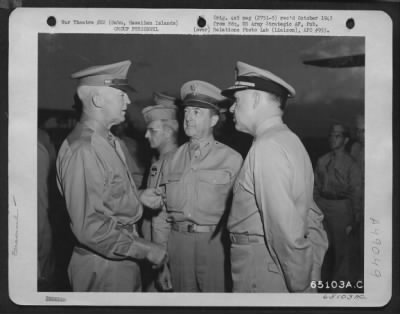 Groups > General Henry H. Arnold Is Greeted By Lt. General Robert C. Richardson, Jr. (Center) And Admiral John H. Towers Upon His Arrival At Hickam Field, Oahu, Hawaiian Islands. On 9 June 1945.