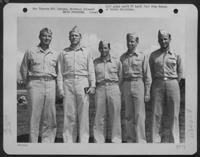 Groups > Brig. General Thomas J. Cushman, Usmc, Commanding General Of The Saipan Air Defense Command, And Colonel Lewis M. Sanders Of Chicage, Illinois, Commanding Officer Of The 318Th Fighter Group, Pose With Squadron Commanders Under The Command Of Colonel Sande