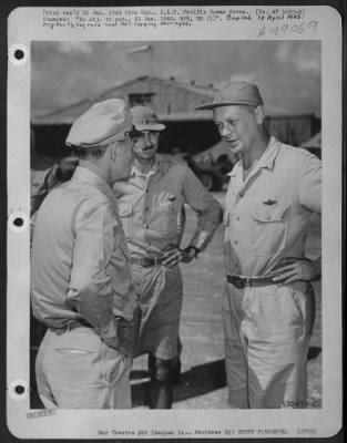 Groups > Lt. Gen. Millard F. Harmon, C.G., Aaf, Pacific Ocean Areas, And Deputy Commander, 20Th A.F., Chats With Brig. Gen. Truman H. Landon, C.G., Vii Bomber Command, During Gen. Harmon'S Visit To Saipan On 5. Dec. 1944.