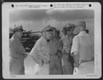 Lt. General Millard F. Harmon Chats With Fellow Officers During Short Visit To Saipan, Marianas Islands. They Are, Left To Right: Brig. General Martin F. Scanlon, General Harmon, Major General Elmer E. Adler And Brig. General Lawrence J. Carr. - Page 1