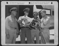 Admiral Ernest J. King, Commander In Chief Of The U. S. Fleet And Chief Of Naval Operations, Discusses An Article In The 'Saturday Evening Post' Magazine With (Left To Right) Rear Admiral Alva Bernhard, Vice Admiral John Hoover, Usn, And Major General Wil - Page 1