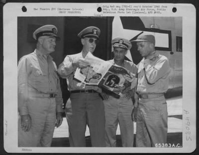 Groups > Admiral Ernest J. King, Commander In Chief Of The U. S. Fleet And Chief Of Naval Operations, Discusses An Article In The 'Saturday Evening Post' Magazine With (Left To Right) Rear Admiral Alva Bernhard, Vice Admiral John Hoover, Usn, And Major General Wil