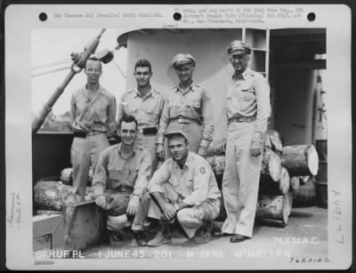 Groups > Major General Clements Mcmullen (Second From Left, Back Row) Poses With Officers Of The 6Th Aircraft Repair Unit (Floating) Aboard Ship Somewhere In The Pacific.