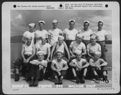 Groups > Machine Shop Personnel Of The 6Th Aircraft Repair Unit (Floating) Pose For The Photographer Aboard Ship Somewhere In The Pacific. 7 September 1945.