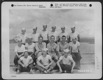 Groups > Engineer Headquarters And Technical Inspection Personnel Of The 6Th Aircraft Repair Unit (Floating) Pose For The Photographer Aboard Ship Somewhere In The Pacific. 7 September 1945.