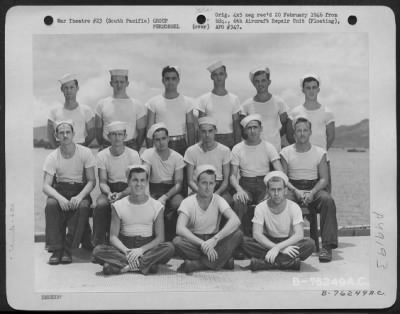 Thumbnail for Groups > Sheet Metal And Plating Personnel Of The 6Th Aircraft Repair Unit (Floating) Pose For The Photographer Aboard Ship Somewhere In The Pacific. 8 September 1945.