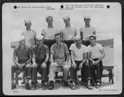 Thumbnail for Groups > Photographic, Drafting And Mail Room Personnel Of The 6Th Aircraft Repair Unit (Floating) Pose For The Photographer Aboard Ship Somewhere In The Pacific. 8 September 1945.