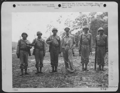 Groups > General Douglas Macarthur, Commander-In-Chief Of The Allied Forces In The Southwest Pacific Area On An Inspection Trip Of American Battle Fronts, Met Representativews Of Five Different American Indian Tribes In One United States Army Unit. Left To Right:
