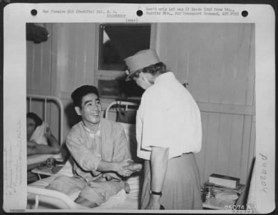 Groups > During Her Tour Of The Pacific Bases Mrs. F. D. Roosevelt Visits K. Komota, A Wounded Japanese American Soldier At Fiji Islands, 1943.