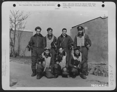 Groups > Aerial Cameraman Of The 92Nd Bomb Group Pose With Their Cameras At An Airbase Somewhere In England.  14 March 1945.