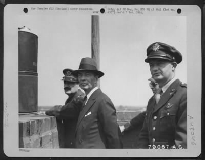 Thumbnail for Groups > In The Observation Tower At A U.S. Airfield In England Watching P-47S Of The 4Th Fighter Group Take Off On A Mission Over Enemy Territory Are (Left To Right) Brig. Gen. Frank O. D. Hunter, Mr. Robert A. Lovett, Assistant Sec. Of War For Air And Colonel E.