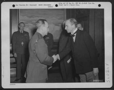 Groups > Major General Lewis H. Brereton Is Congratulated In The Name Of The King By Sir Archibald Sinclair, Secretary Of State For Air And Other Dignataries After He Was Awarded An Honorary Knighthood In London, England On 16 November 1943.
