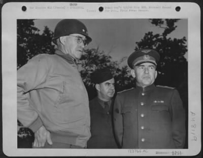Groups > Lt. Gen. Omar Bradley, Left, Is Shown Explaining The Allied Campaign In Normandy To Major General Schraapov, One Of The Three Soviet Officers Who Visited The Beach Head.  Colonel John S. Griffith, Center, Accompanied The Russian Officers On Their Tour Of