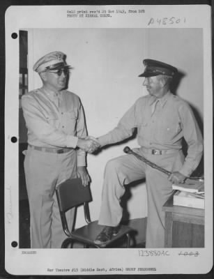 Groups > Middle East Air Depot:  Lt. Colonel Robert M. Baughey, 1002 'O' St. Sacramento, Calif., Executive Officer At A Middle East Air Depot Under The 9Th Air Service Command, Greets Brig. General G.X. Cheves, Chief Of Staff, United States Army Forces In The Midd