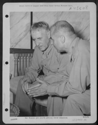 Groups > Mr. Henry L. Stimson, Secretary Of War, And Major General James H. Doolittle Discuss World War Ii At A Base Somewhere In North Africa.