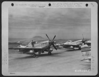 North American > Two North American P-51 Mustangs 'Tiny Gay Babe' & 'Three Of A Kind' On Parking Area, Iwo Jima, Bonin Islands. [21St Fighter Group, 72Nd Squadron, 1945]