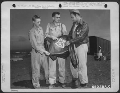 Fighter > Three P-51 "Mustang" Pilots Of The 506Th Fighter Group Display Insignia Of Tokyo Club On Jacket. Iwo Jima, Bonin Islands.