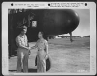 Two Pilots Of The 318Th Fighter Group Shaking Hands Beside The Northrop P-61 Black Widow 'Little Joe' At Airfield On Iwo Jima, Bonin Islands, June 1945. - Page 1