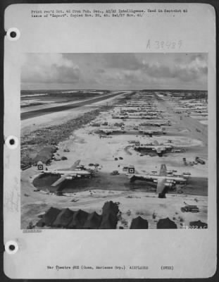 Consolidated > Squatting In Their Dispersal Area At North Field, Guam, (Marianas Group) Are Planes Of The 29Th Bomb Group, 314Th Wing.  This View, Looking East, Shows Part Of The Southwestern Area Of North Field.  The 19Th B.G.'S B-29'S Are Located In The Background.