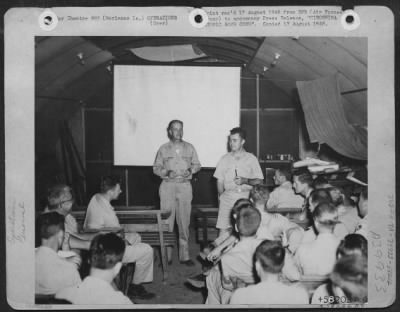 Thumbnail for Consolidated > Hiroshima Atomic Bomb Crew.  (No. 2 Of Seven Pictures.)  At The Briefing Prior To The Flight Of The Enola Gay, Capt. William S. Parsons And Colonel Tibbets Go Over Last-Minute Data.  Both Are Members Of The Crew That Dropped The First Atomic Bomb.