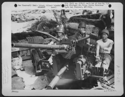 Thumbnail for ␀ > Anti-Aircraft Crew Man A 37 Mm. Gun On Makin Island, Gilbert Islands.  Left To Right:  Pfc. John Pellsoner Of St. Johnsville, New York; Pvt. Lawrence Townsend Of Hammond, New York; And Cpl. Jesse Cope, Eakly, Oklahoma, 1943.