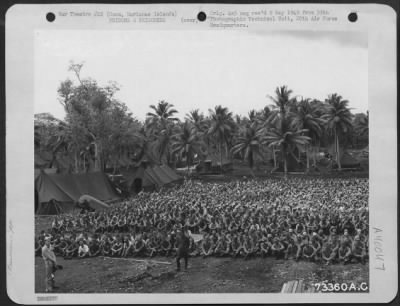 Thumbnail for Consolidated > Hundreds Of Japs Seated On The Ground At A Prisoner Of War Camp On Guam, Marianas Islands. 6 September 1945.