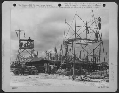 Construction, Buildings > Control Tower Under Construction On Betio, Tarawa Island, In The Gilbert Island Group.  The Old Control Tower Is In The Background.  19 January 1944.