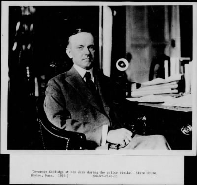 1919 > Gov. Coolidge at his desk during the police strike