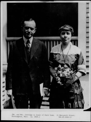 1920 > Mr. and Mrs. Coolidge in front of their house, Northampton, Mass.