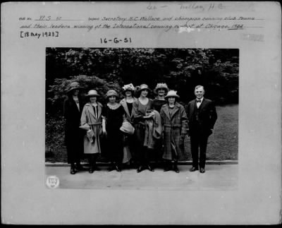 1923 > Secretary H. C. Wallace and champion canning club team at Chicago