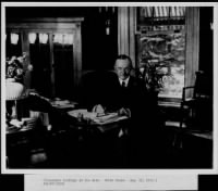 President Coolidge at his desk, White House, Washington, D. C. - Page 1