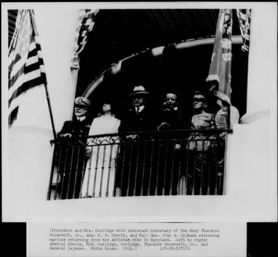 1924 > President and Mrs. Coolidge with Roosevelt, Eberle and Lejeune reviewing Marines