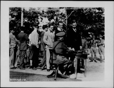 1925 > John Coolidge entering C.M.T.C. Camp Devens, Mass.