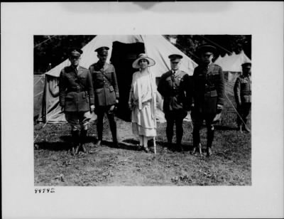 ␀ > Mrs. Coolidge in front of tent