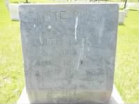 Face_of_White_Swan's_(Crow_Scout_and_Artist)_grave_stone_at_the_Little_Bighorn_National_Cemetery..jpg