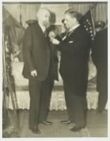 General A. W. Greely receiving the congression[al] medal from George Debt.jpg