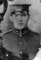 Ollie in uniform with hat  copy blk and wht.jpg