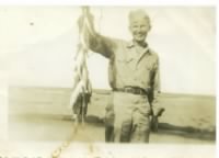 Thumbnail for Clarence, WWII, with fish.jpg