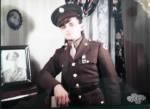 Andrew Koran in uniform with photo of GTK Sr. about 1943.JPG