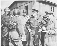 High-ranking_U.S._Army_officers_inspect_the_newly_liberated_Ohrdruf_concentration_camp.jpg