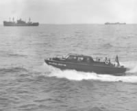 Thumbnail for Andres de Jesus (Jesse) Serrato Lopez  USS Banner APA-60 Smaller boat carried by Banner 1945..jpg