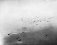 C-47_transport_planes_release_hundreds_of_paratroops.jpg