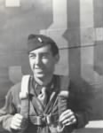 With parachute, volunteered to be gunnery officer on bombing raids  .jpg