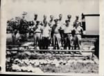 ID Kohlman crew -Top L to R Bob Burris,  Tom Shanks, Martin Bernstein,  Dave Holden, Joe Kohlman, Roland Duggan.Front L to R Chas Driesbach, Joe Black, Frank McGrew Willis, George Roberts, Lynn Tanner.JPG